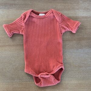 kate quinn Ribbed rust Bodysuit